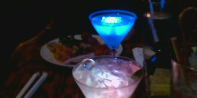 Illuminated dinner drinks on a date