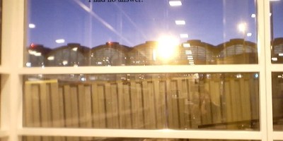 Reflections in an airport window