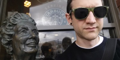 Sitting with the statue outside Barnes and Noble in downtown Naperville, IL