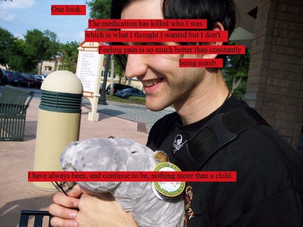 Me clutching a stuffed hippo