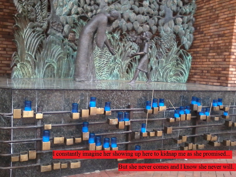 Wall of candles for the dead and sick