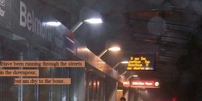Rainy night on the Belmont L station platform